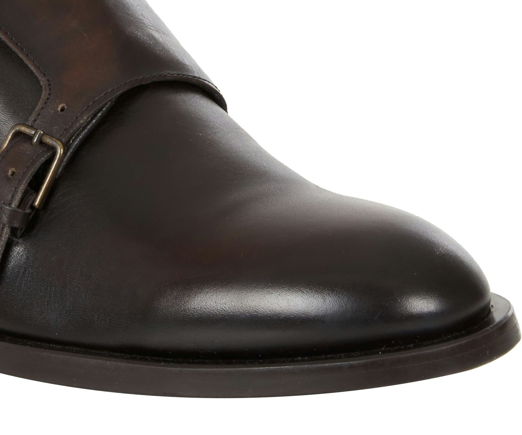footwear-retouching-leather-marks-after Closeup product photo of leather shoe retouched to remove wrinkles and background